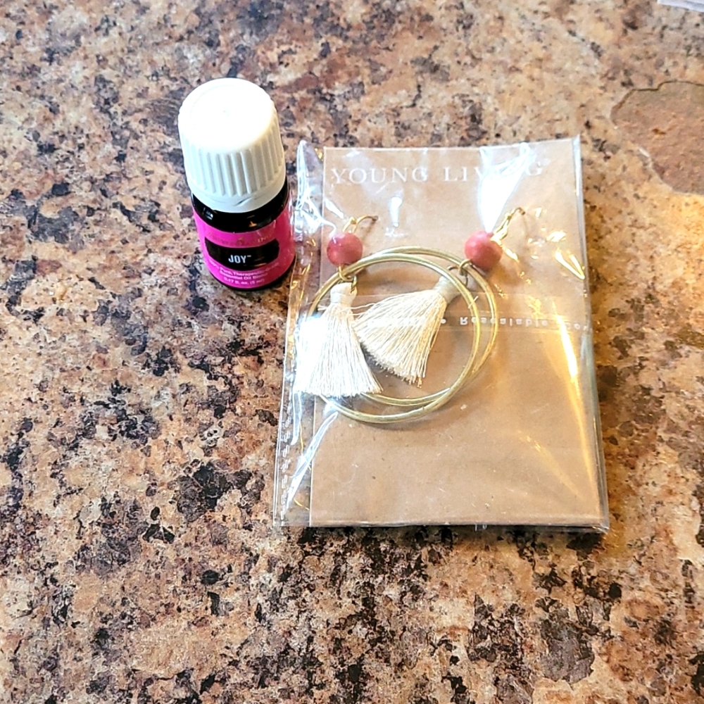 YL earrings and oil
